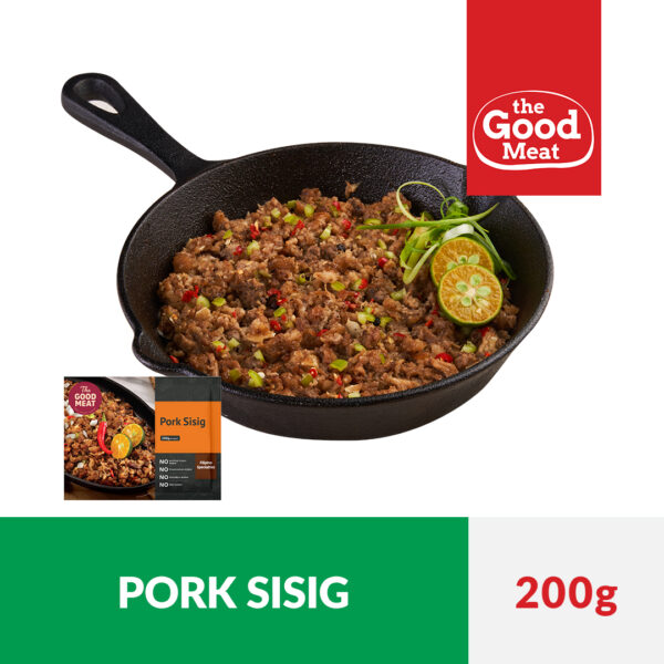 Pork Sisig on a pan with calamansi