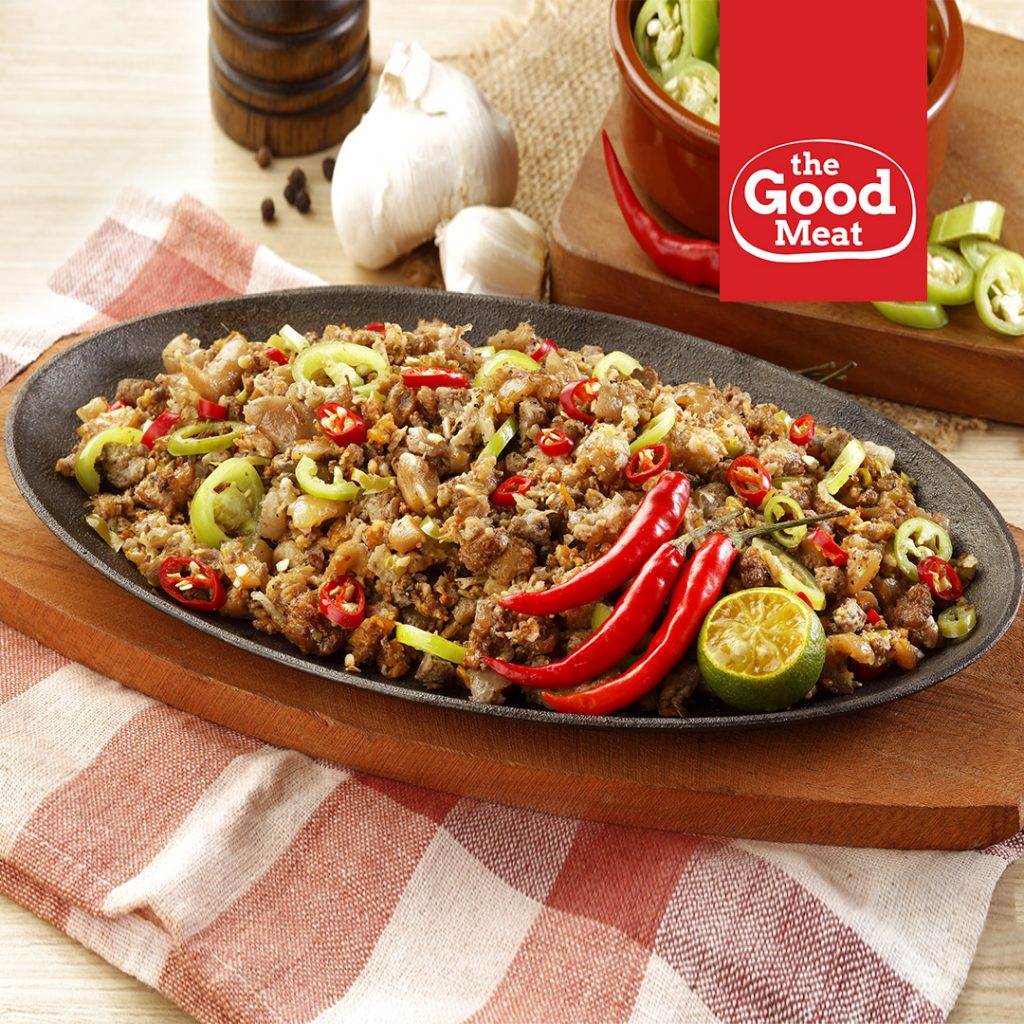 Serving sizzling sisig from Sisig Fiesta Spicy Pork