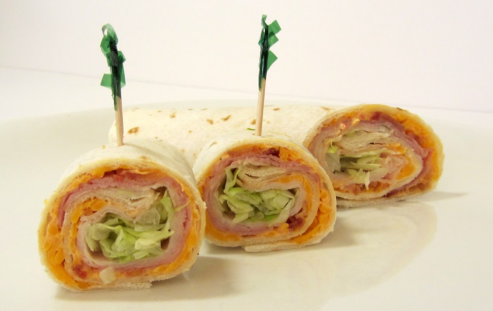 3 pieces of club roll ups made of ham